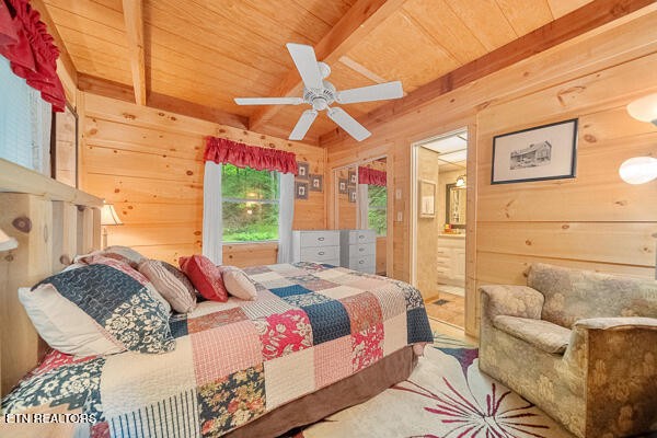 3127 Emerald Springs Loop Sevierville, TN 37862 - Photo 38 of 60 a bedroom with a bed a window and walk in closet
