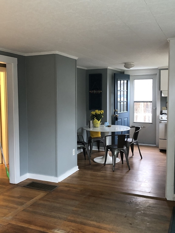 14 Bayberry Road Bourne, MA 02532 - Photo 6 of 16 a view of a dining room with furniture and window