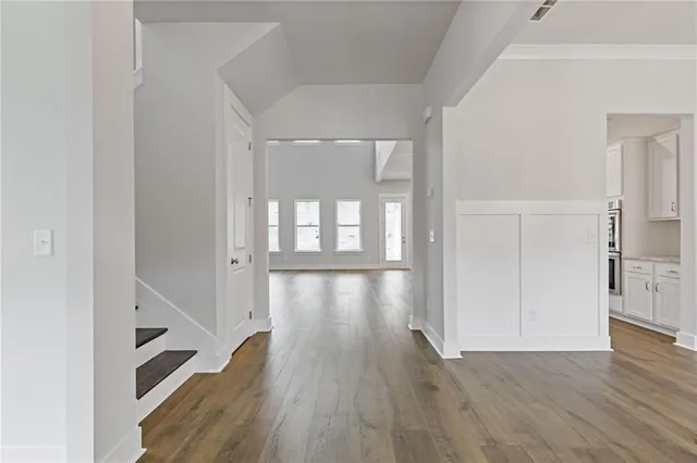 a view of gallery with wooden floor