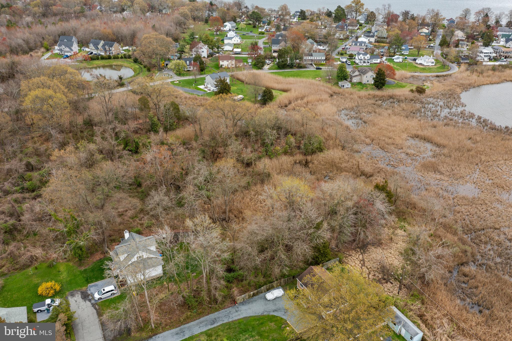 617 Ford Road Deale, MD 20751 - Photo 2 of 8 a view of a lake with houses