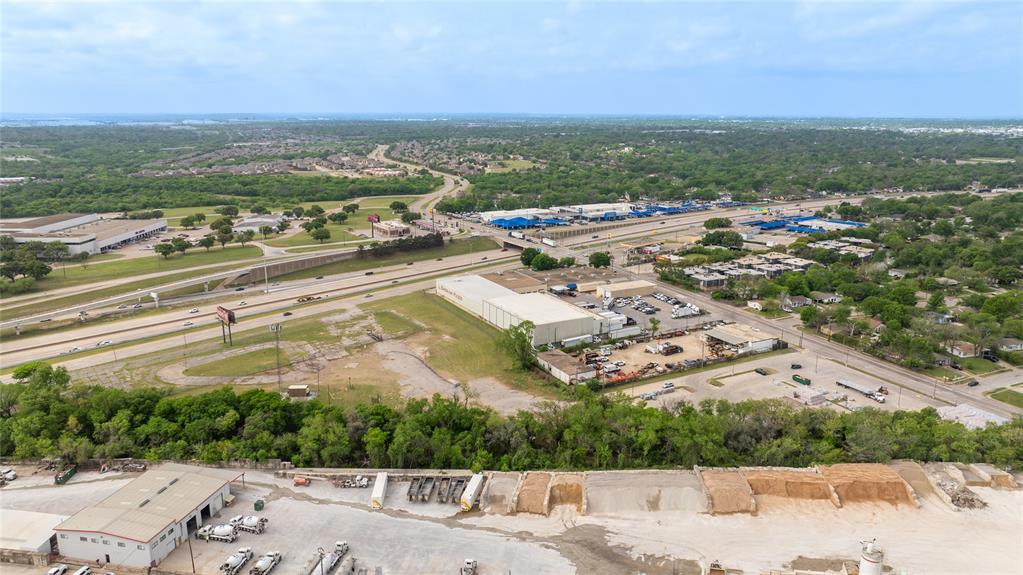 600 Southwest Loop 820 Fort Worth, TX 76115 - Photo 16 of 31 an aerial view of residential houses with outdoor space