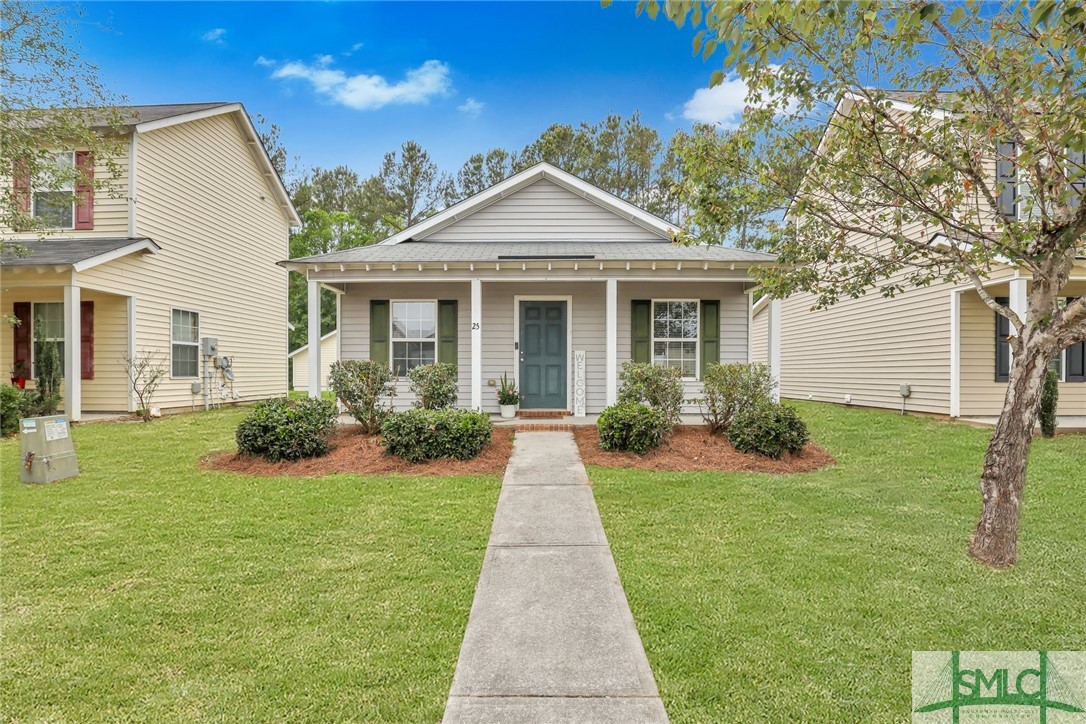 25 Rosa Lane Savannah, GA 31419 - Photo 1 of 32 Grass has been greened.