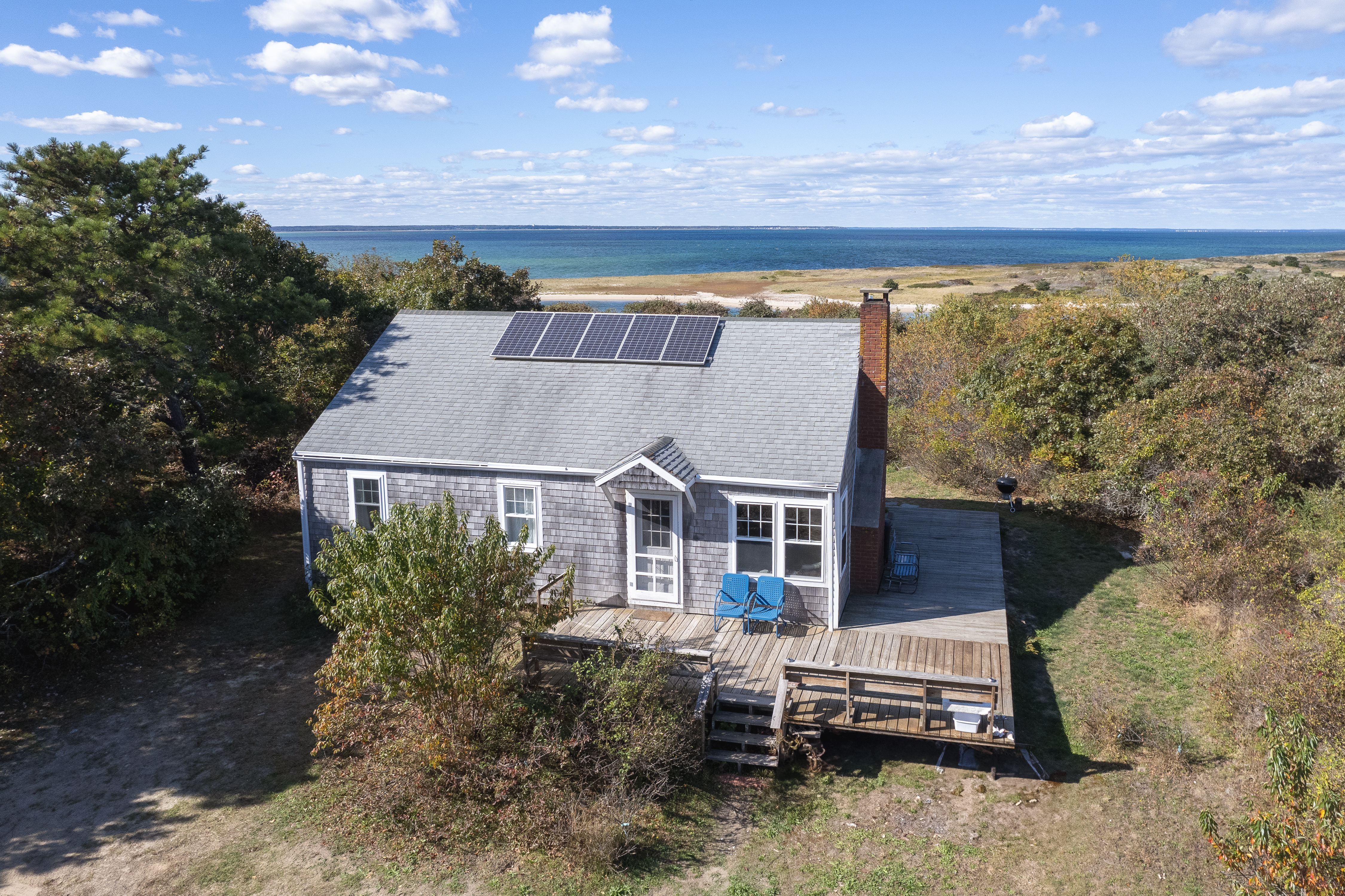 9 North Neck Road Edgartown, MA 02539 - Photo 3 of 12 a view of a house with a yard