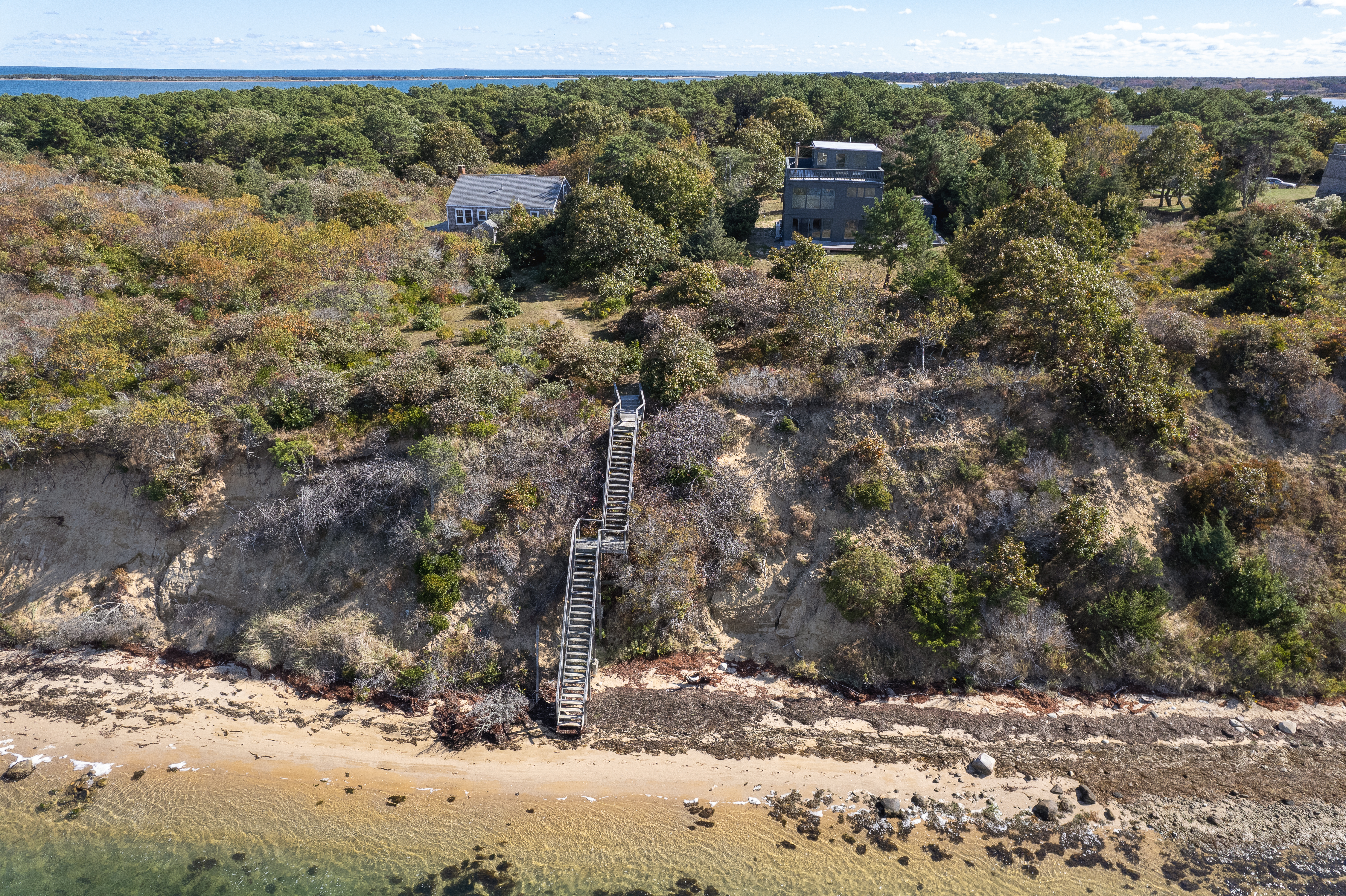 9 North Neck Road Edgartown, MA 02539 - Photo 5 of 12 a view of a forest with a mountain