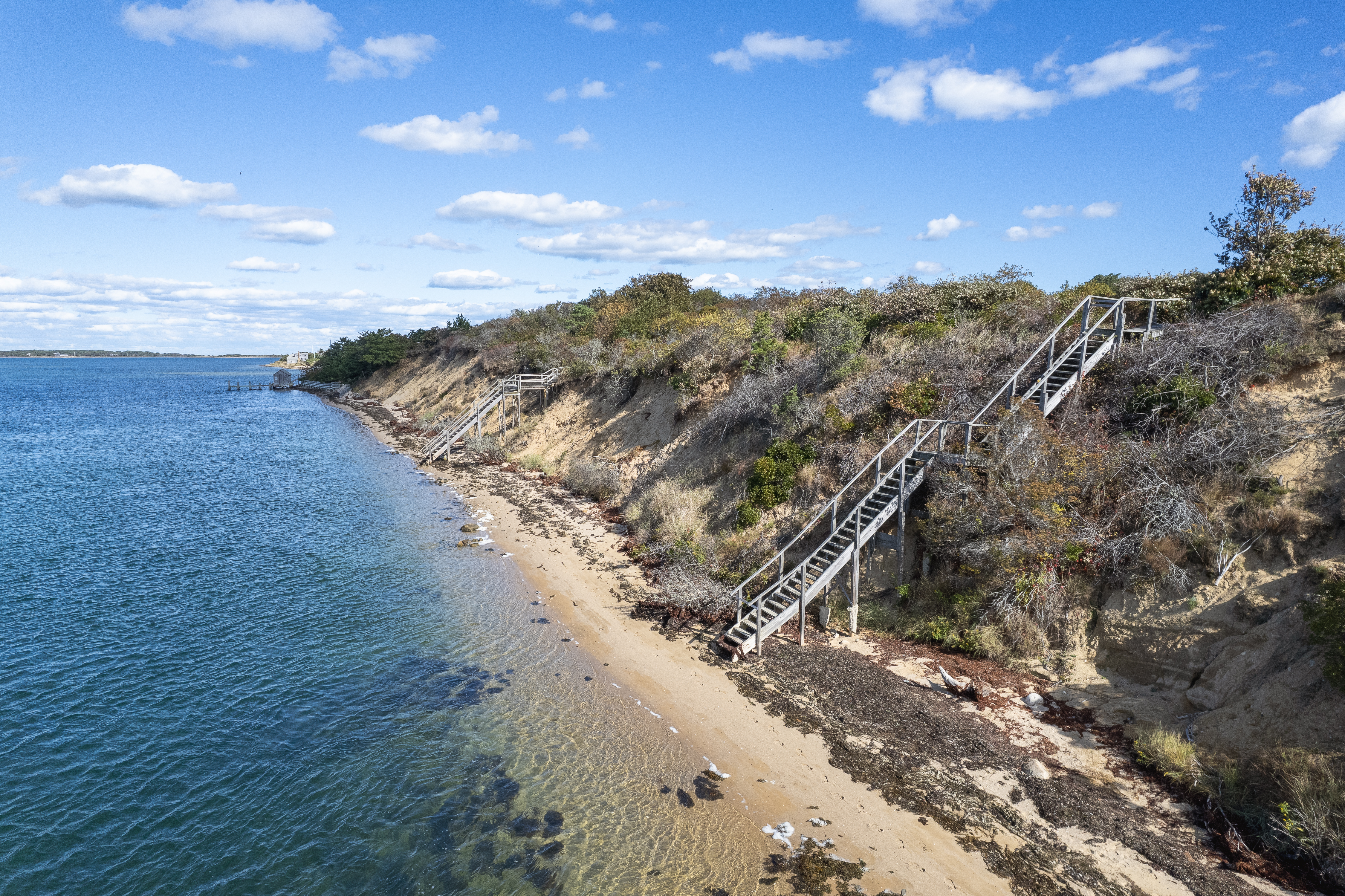 9 North Neck Road Edgartown, MA 02539 - Photo 9 of 12 a view of a dry yard with mountains in the background