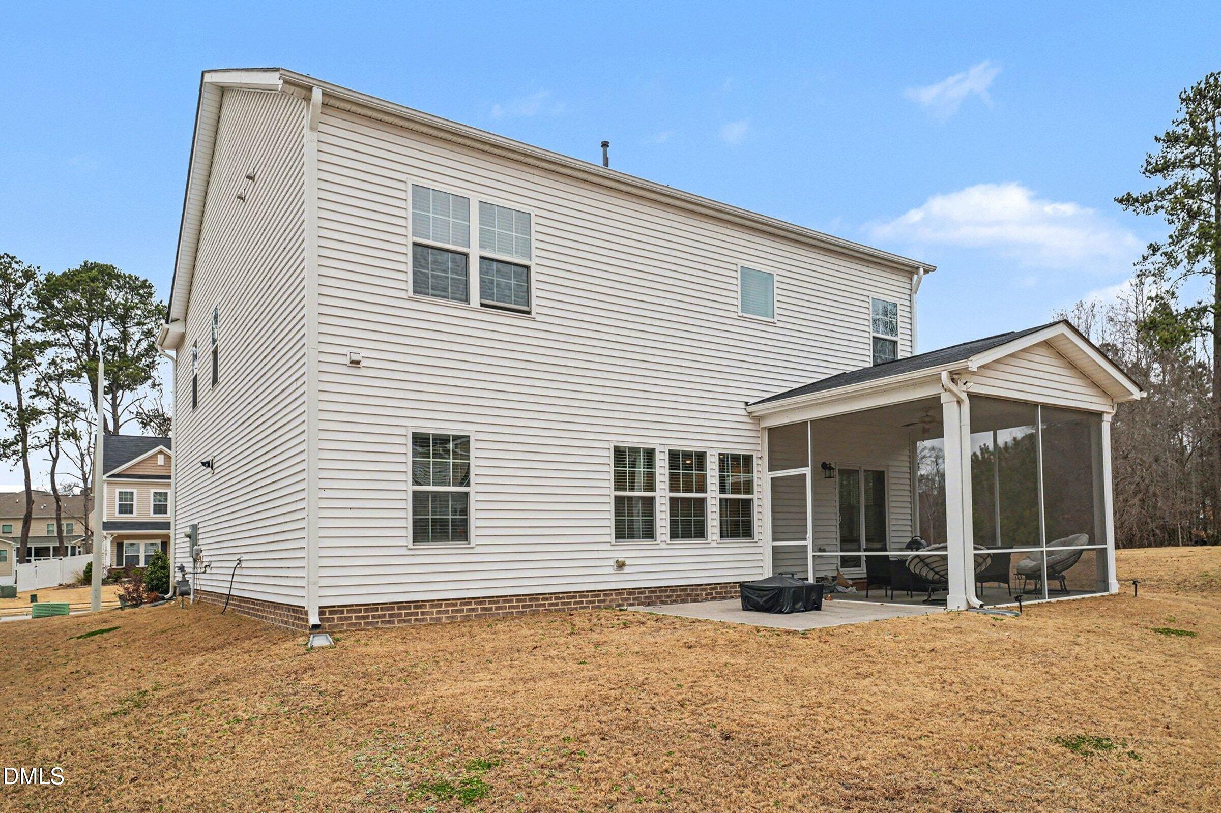 183 Axis Deer Lane Garner, NC 27529 - Photo 33 of 35 a view of a house with a patio