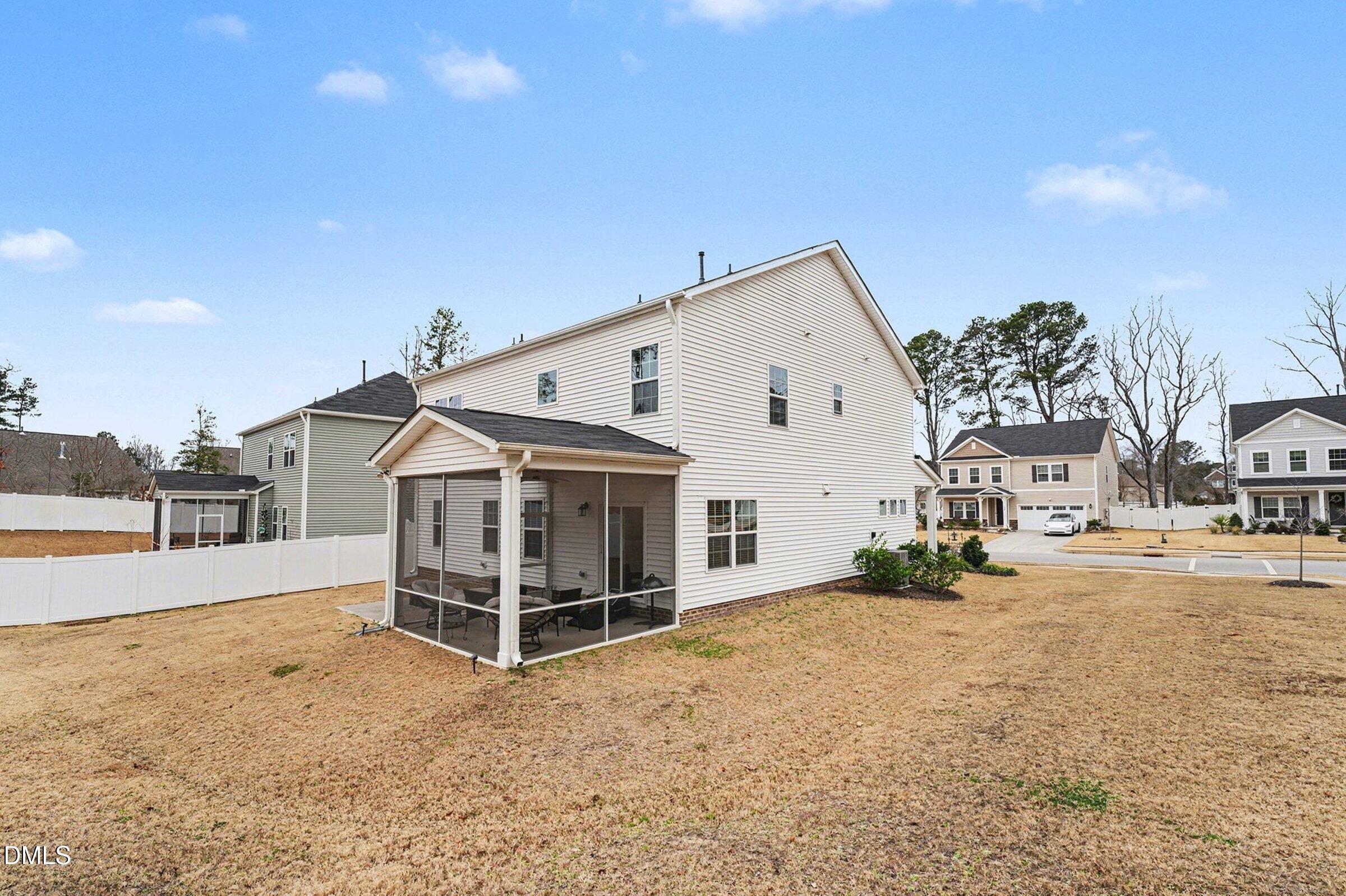 183 Axis Deer Lane Garner, NC 27529 - Photo 34 of 35 a view of a house with a yard
