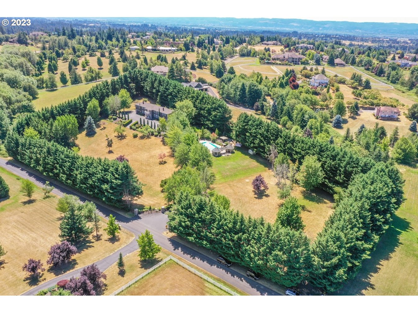 21418 Northwest 11th Avenue Ridgefield, WA 98642 - Photo 1 of 42 an aerial view of a house with a yard and lake view