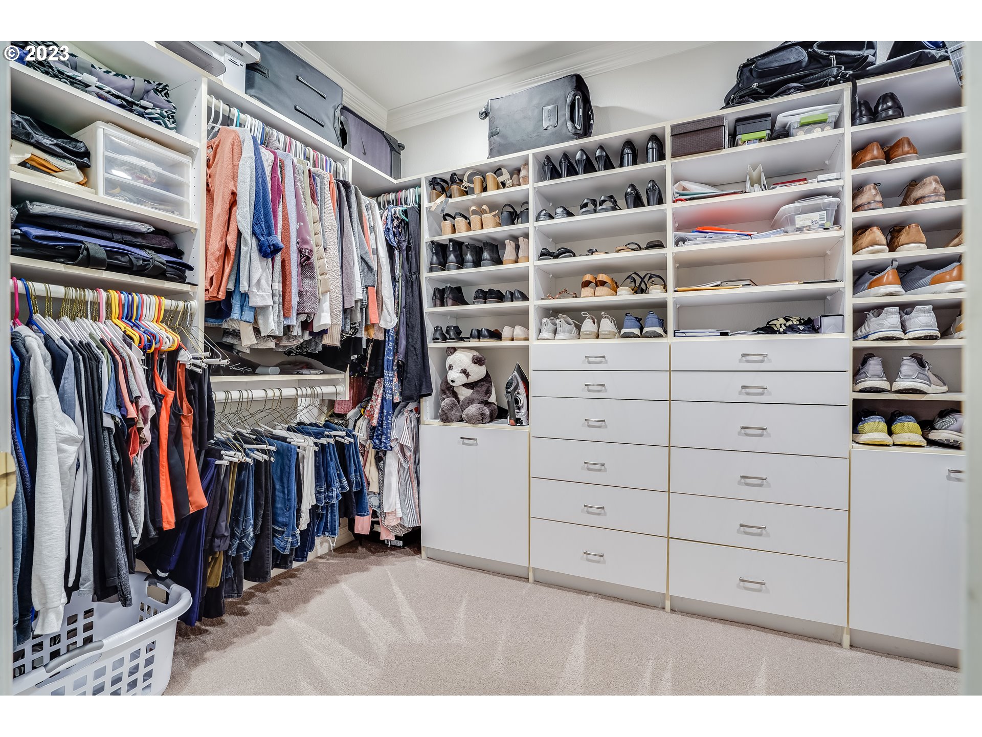 21418 Northwest 11th Avenue Ridgefield, WA 98642 - Photo 17 of 42 a view of walk in closet with clothes and shoes