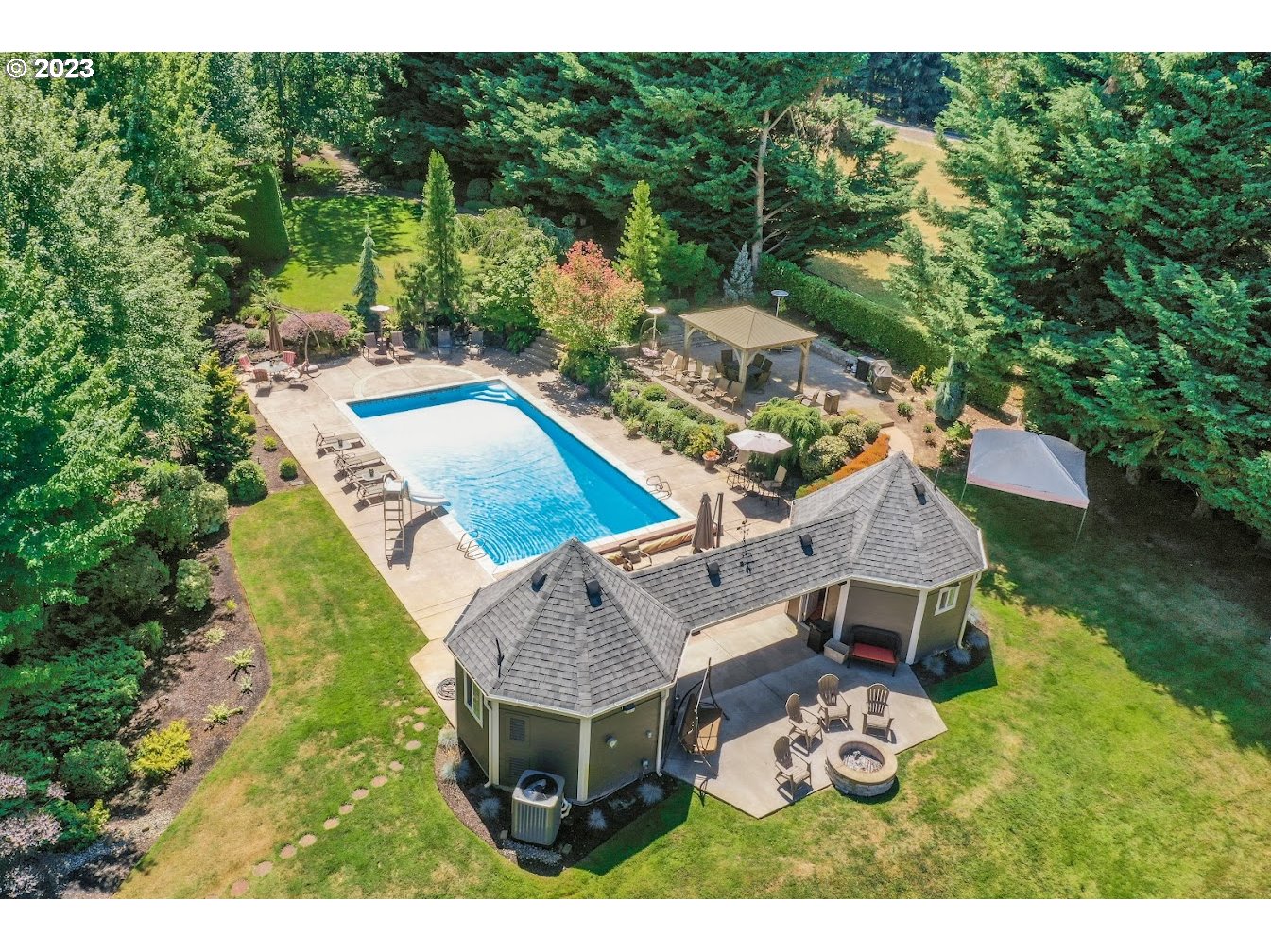 21418 Northwest 11th Avenue Ridgefield, WA 98642 - Photo 2 of 42 a view of a wooden deck and a yard with green space