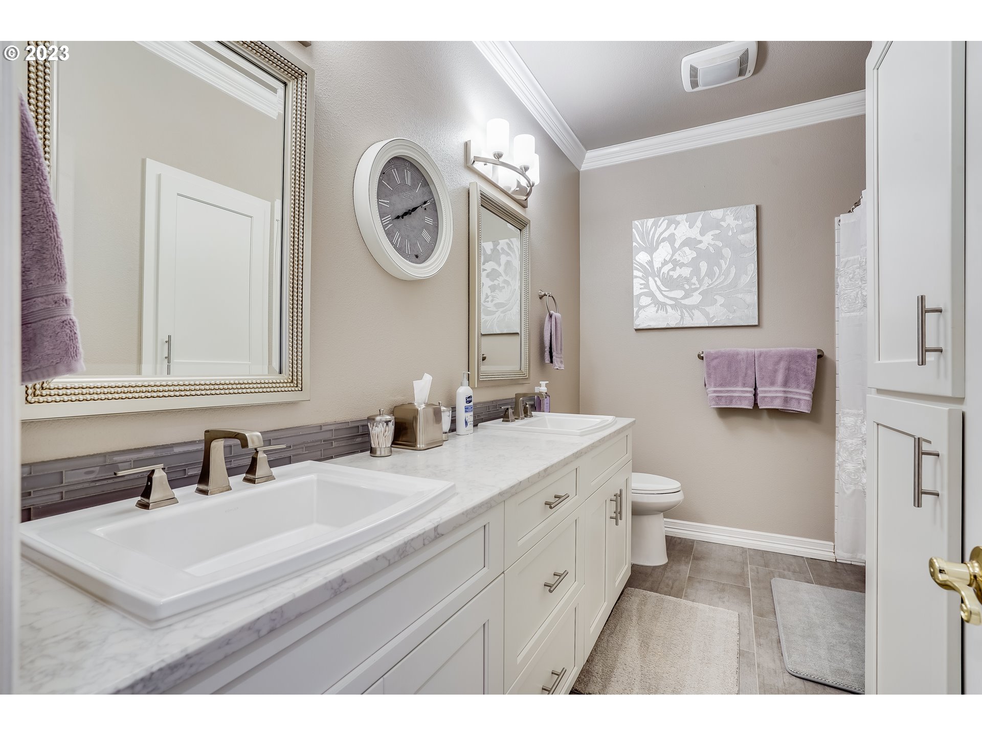 21418 Northwest 11th Avenue Ridgefield, WA 98642 - Photo 21 of 42 a bathroom with a sink and a mirror