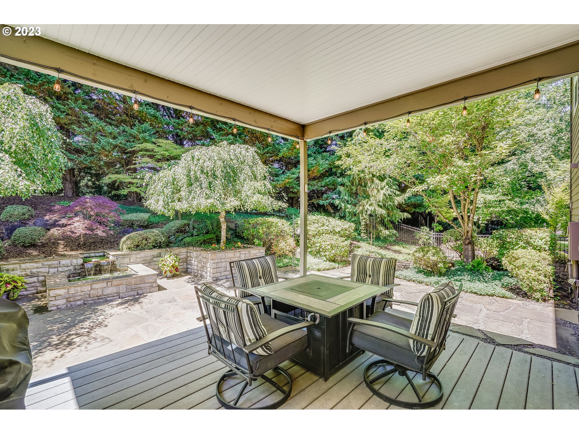 21418 Northwest 11th Avenue Ridgefield, WA 98642 - Photo 29 of 42 a view of an outdoor sitting area with furniture and wooden floor