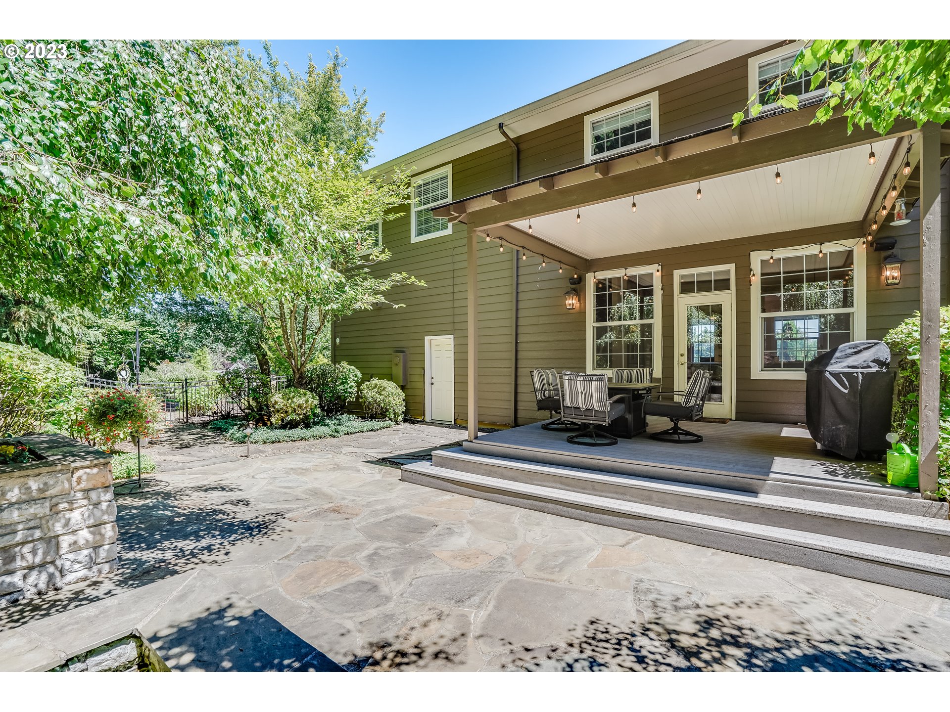 21418 Northwest 11th Avenue Ridgefield, WA 98642 - Photo 30 of 42 a view of a chair and tables in the patio