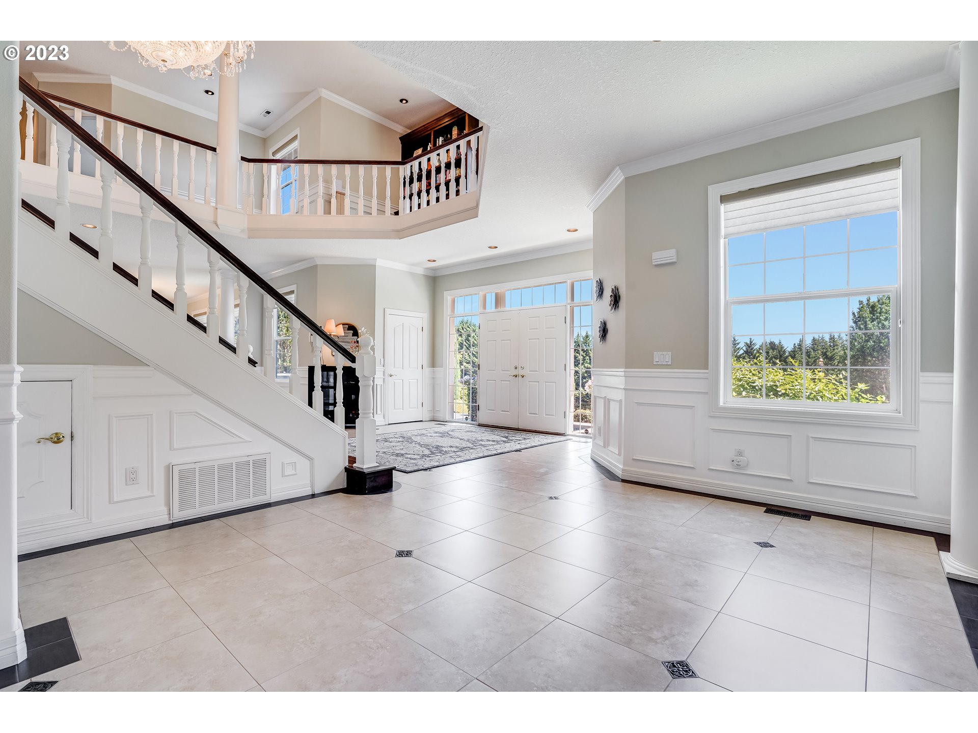 21418 Northwest 11th Avenue Ridgefield, WA 98642 - Photo 5 of 42 a view of an entryway with wooden floor