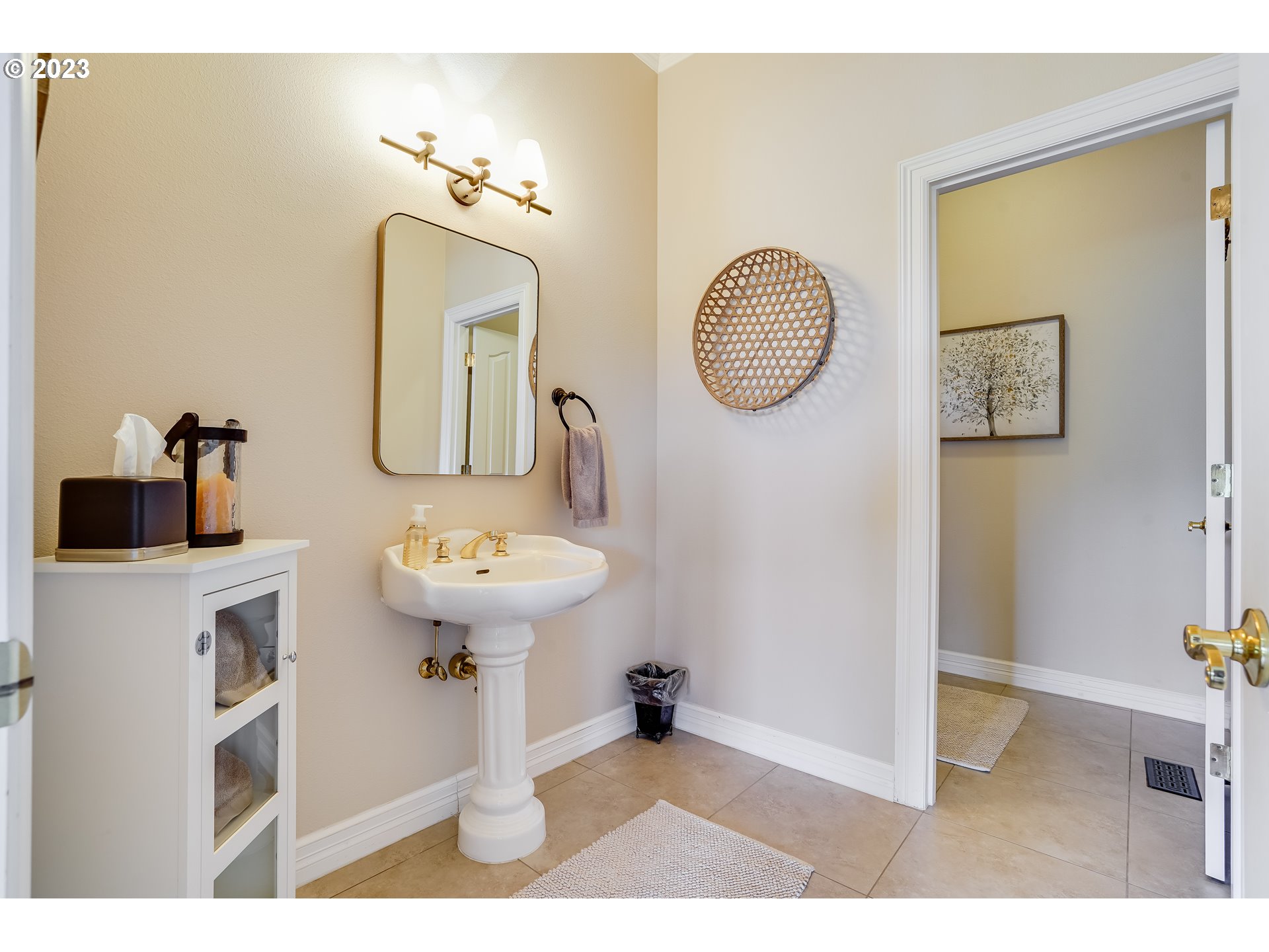 21418 Northwest 11th Avenue Ridgefield, WA 98642 - Photo 8 of 42 a bathroom with a sink mirror and window