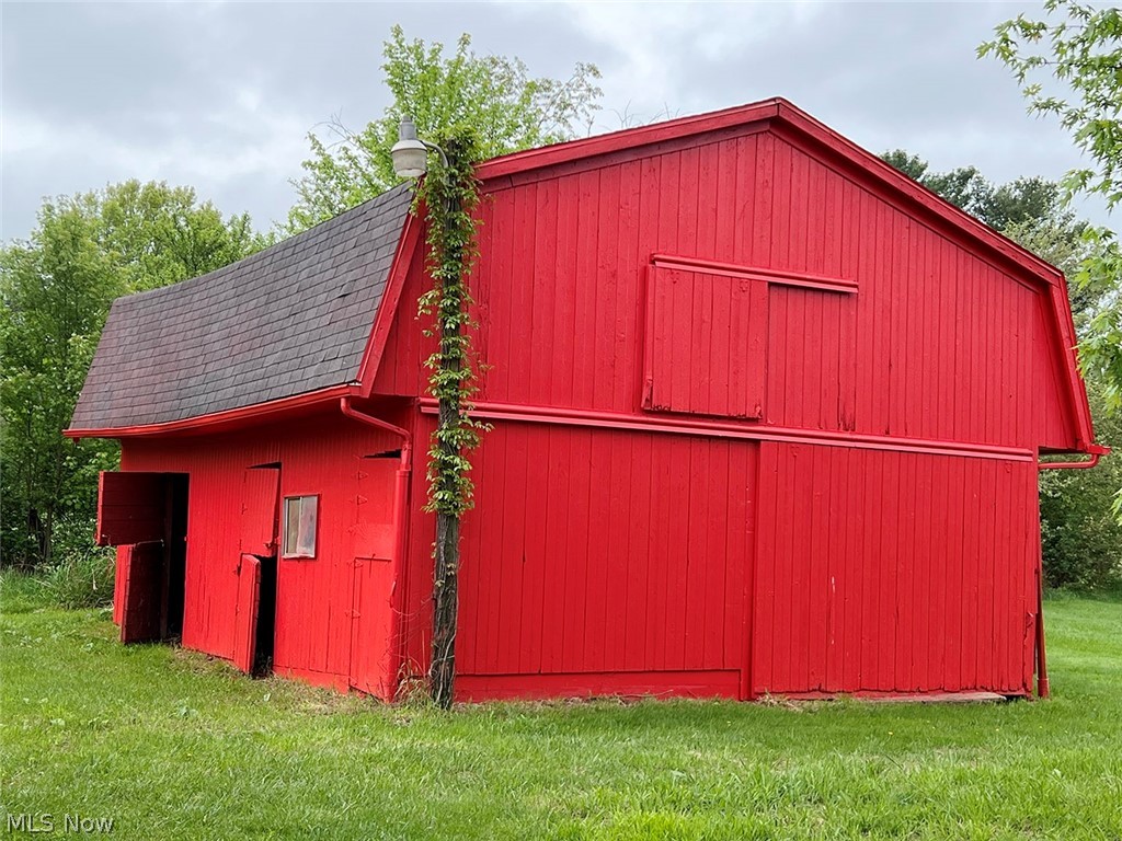550 Johnson Road Wadsworth, OH 44281 - Photo 36 of 40 View of outdoor structure with a lawn