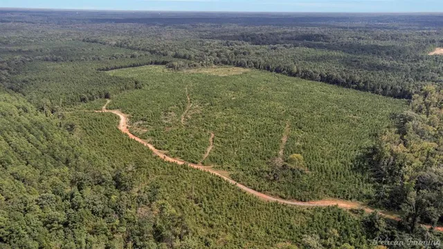 a view of a field with an outdoor space