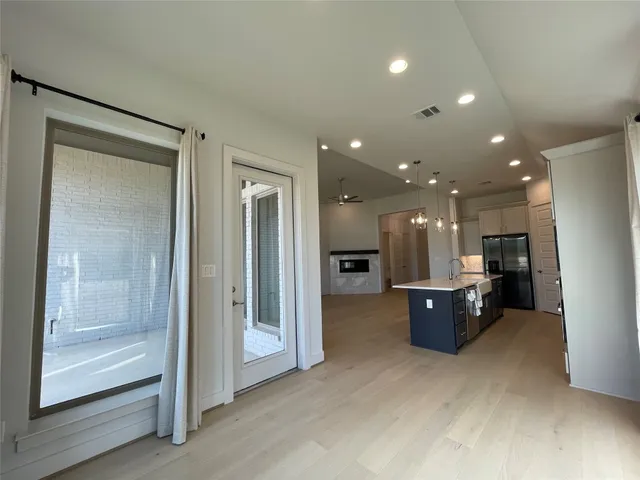 a view of an empty room and window