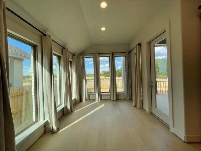 an empty room with closet and closet