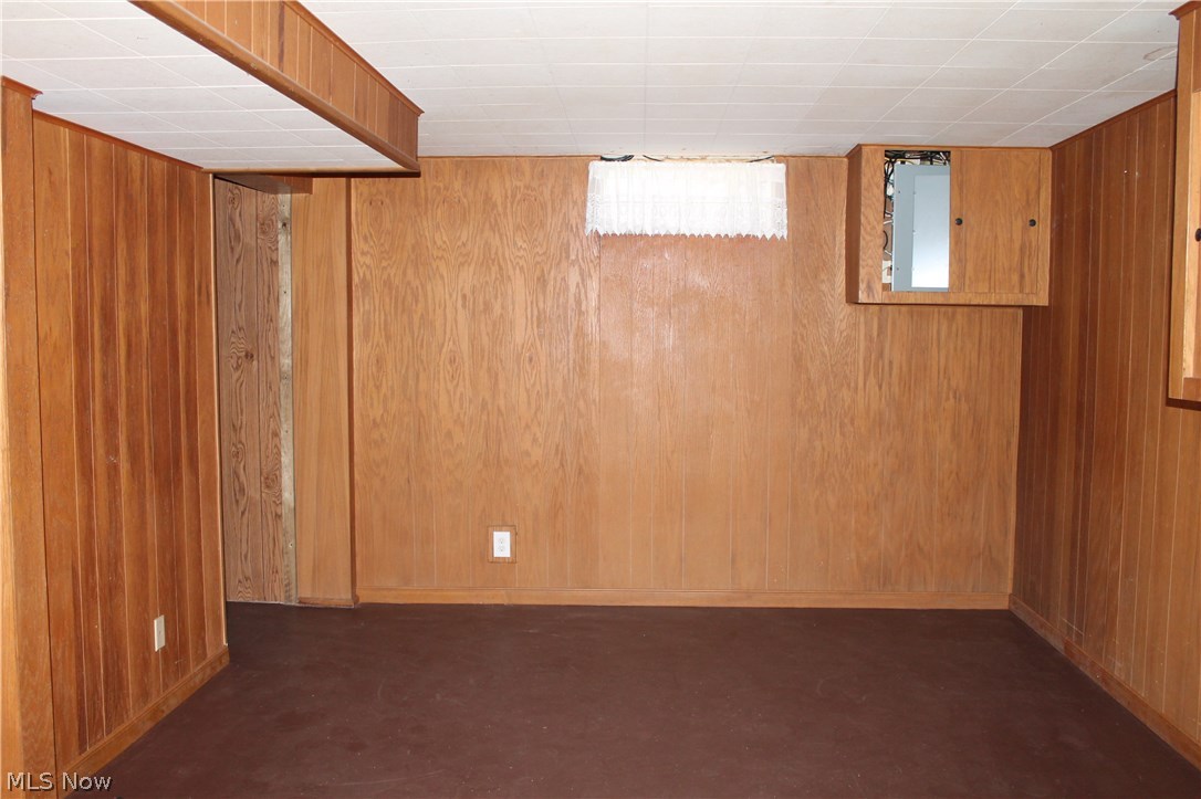4885 Arbor Road Southwest Canton, OH 44710 - Photo 12 of 15 Basement provides a large laundry/utility room with a shower, utility sink and storage space. Pictured above is the first bonus room, the doorway to the left opens to a large rec room area. A little sprucing up for these two rooms and you have some great additional living space. 220 electric service.