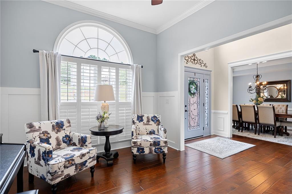 204 Golden Bell Way Canton, GA 30115 - Photo 8 of 81 a living room with furniture and a wooden floor