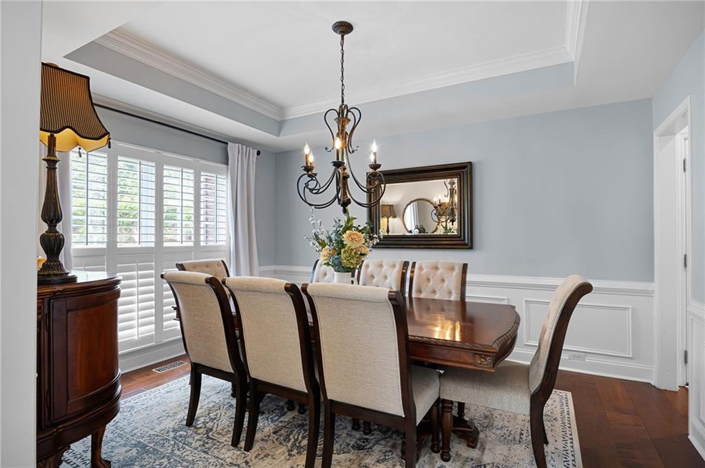 204 Golden Bell Way Canton, GA 30115 - Photo 10 of 81 a dining room with furniture and window