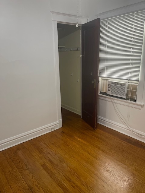 209 Circle Avenue, Unit 1 Forest Park, IL 60130 - Photo 5 of 9 a view of an empty room with a window