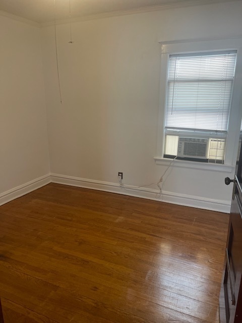 209 Circle Avenue, Unit 1 Forest Park, IL 60130 - Photo 7 of 9 a view of a room with wooden floor and windows