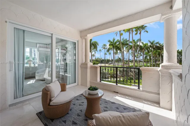 a bathroom with a double vanity sink mirror and shower