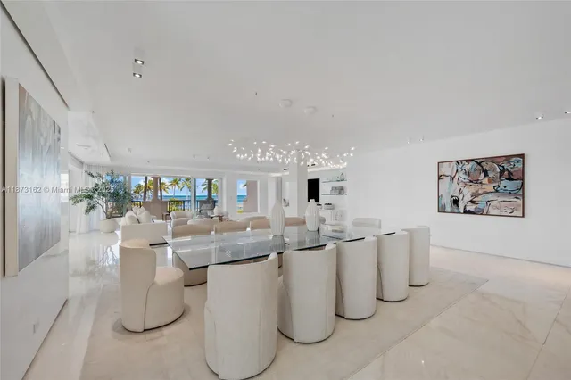 a dining room with furniture and a table