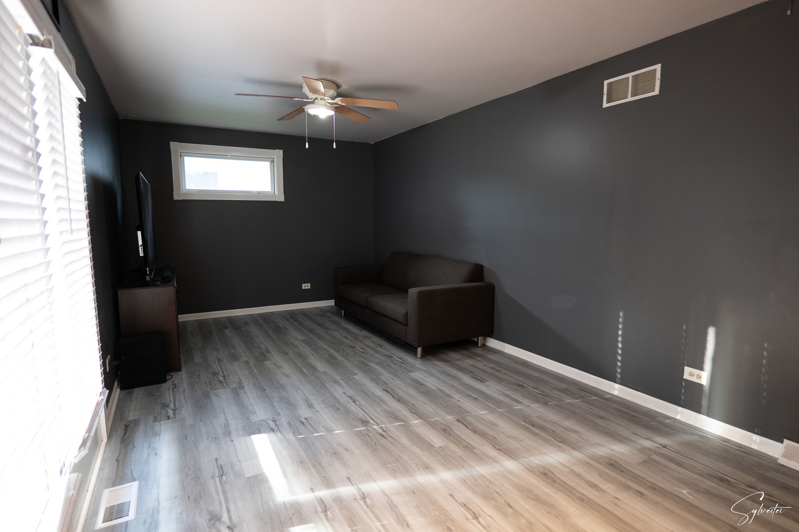 904 Chippewa Drive Elgin, IL 60120 - Photo 11 of 35 a bedroom with a bed and a chandelier