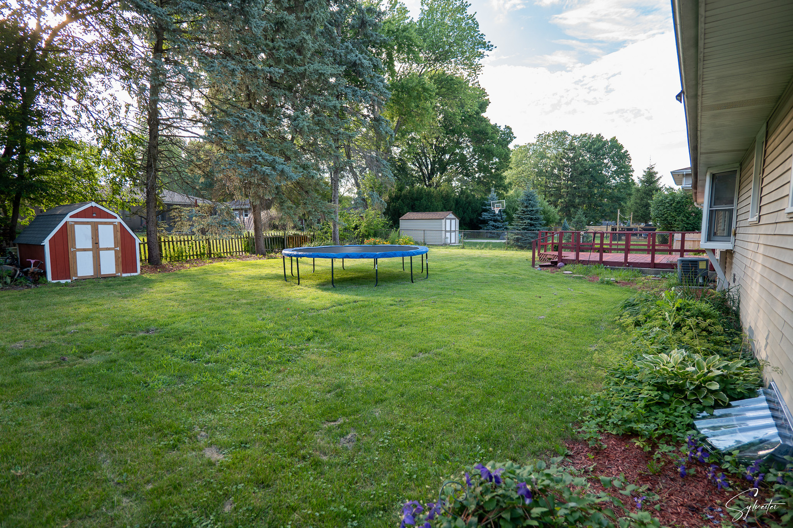 904 Chippewa Drive Elgin, IL 60120 - Photo 29 of 35 a view of a chairs and table in the backyard