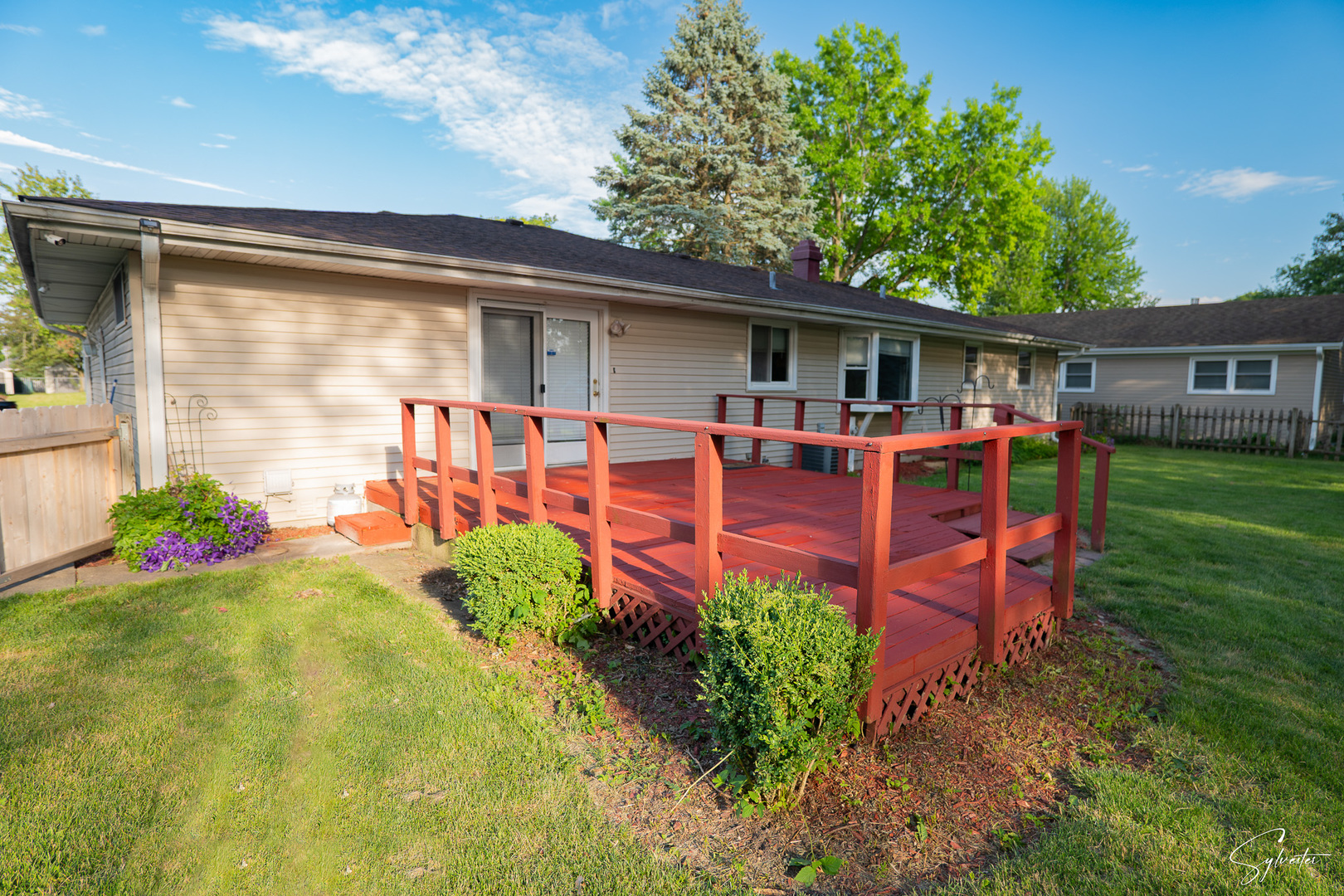 904 Chippewa Drive Elgin, IL 60120 - Photo 30 of 35 a view of a house with backyard sitting area and garden