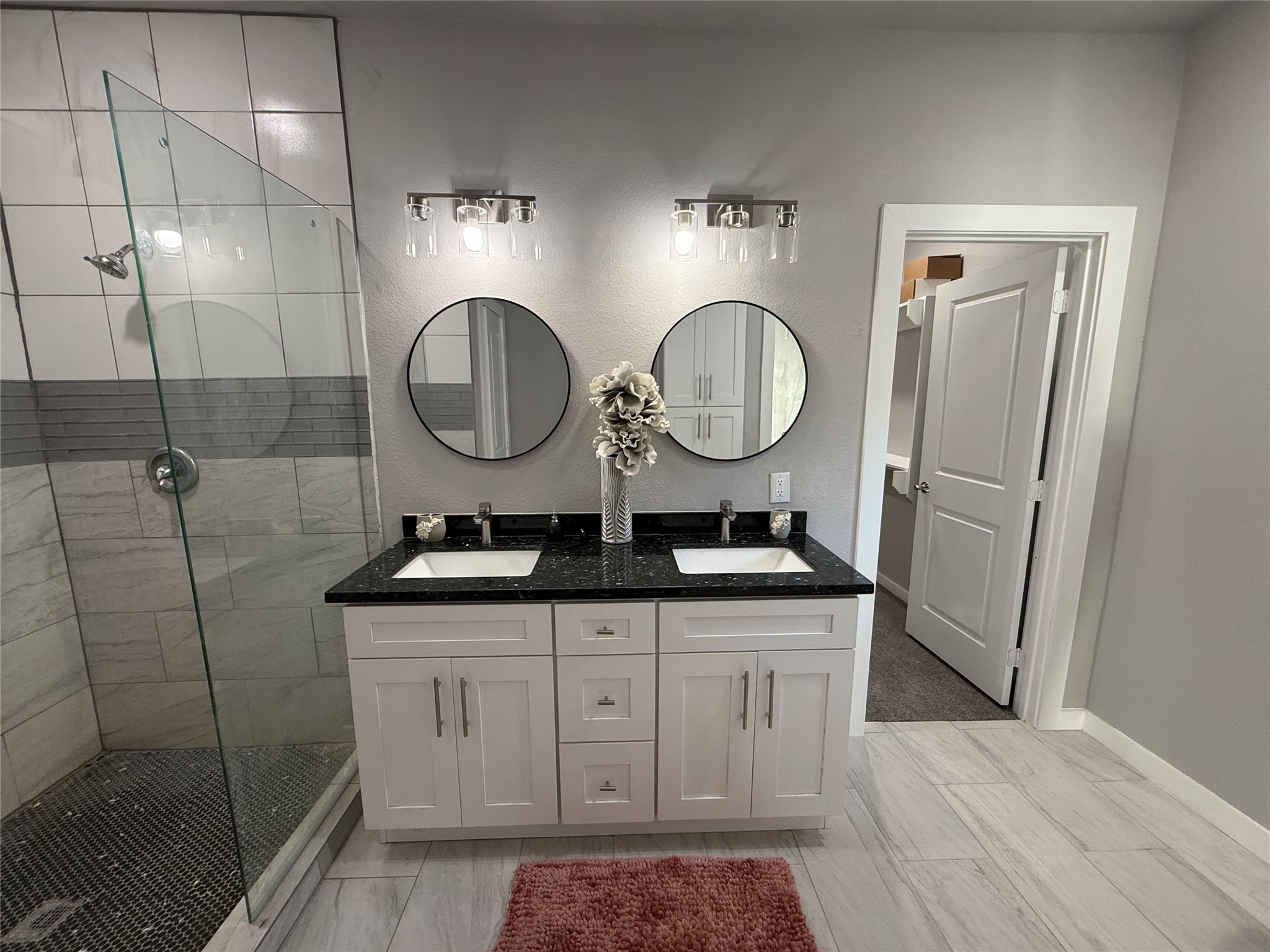 215 South 7th Street Beasley, TX 77417 - Photo 12 of 16 a bathroom with a granite countertop sink a toilet and a mirror