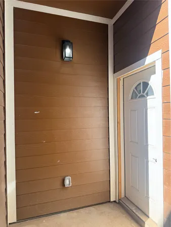a kitchen with a sink a stove and cabinets
