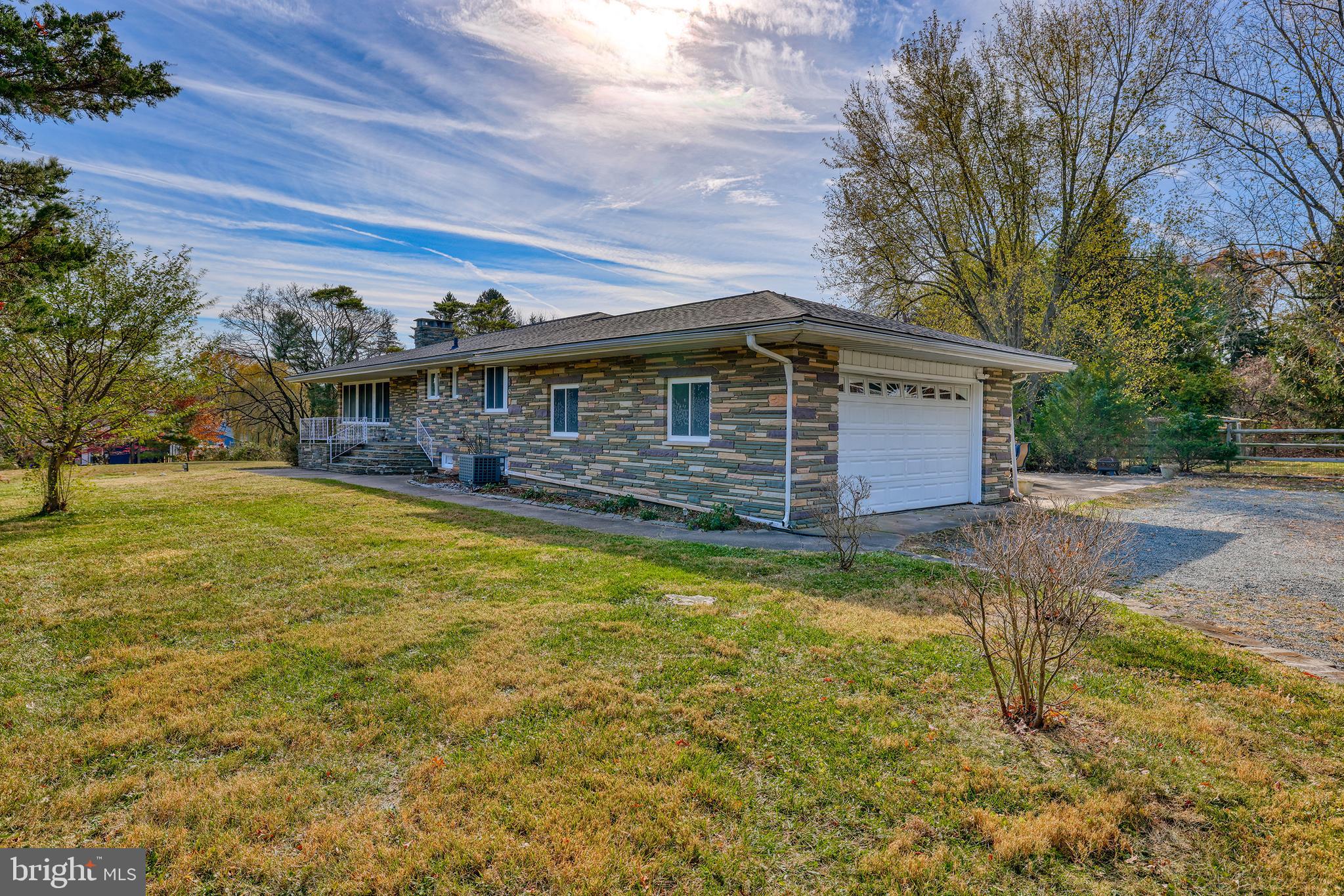 2627 Pennington Road Pennington, NJ 08534 - Photo 1 of 31 a view of a house with a yard