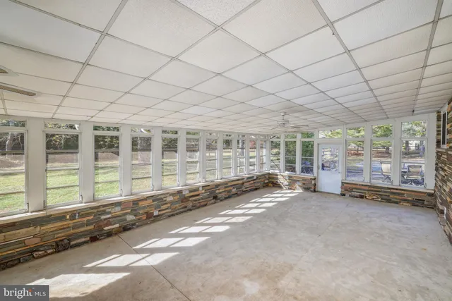 a view of a room with a large windows
