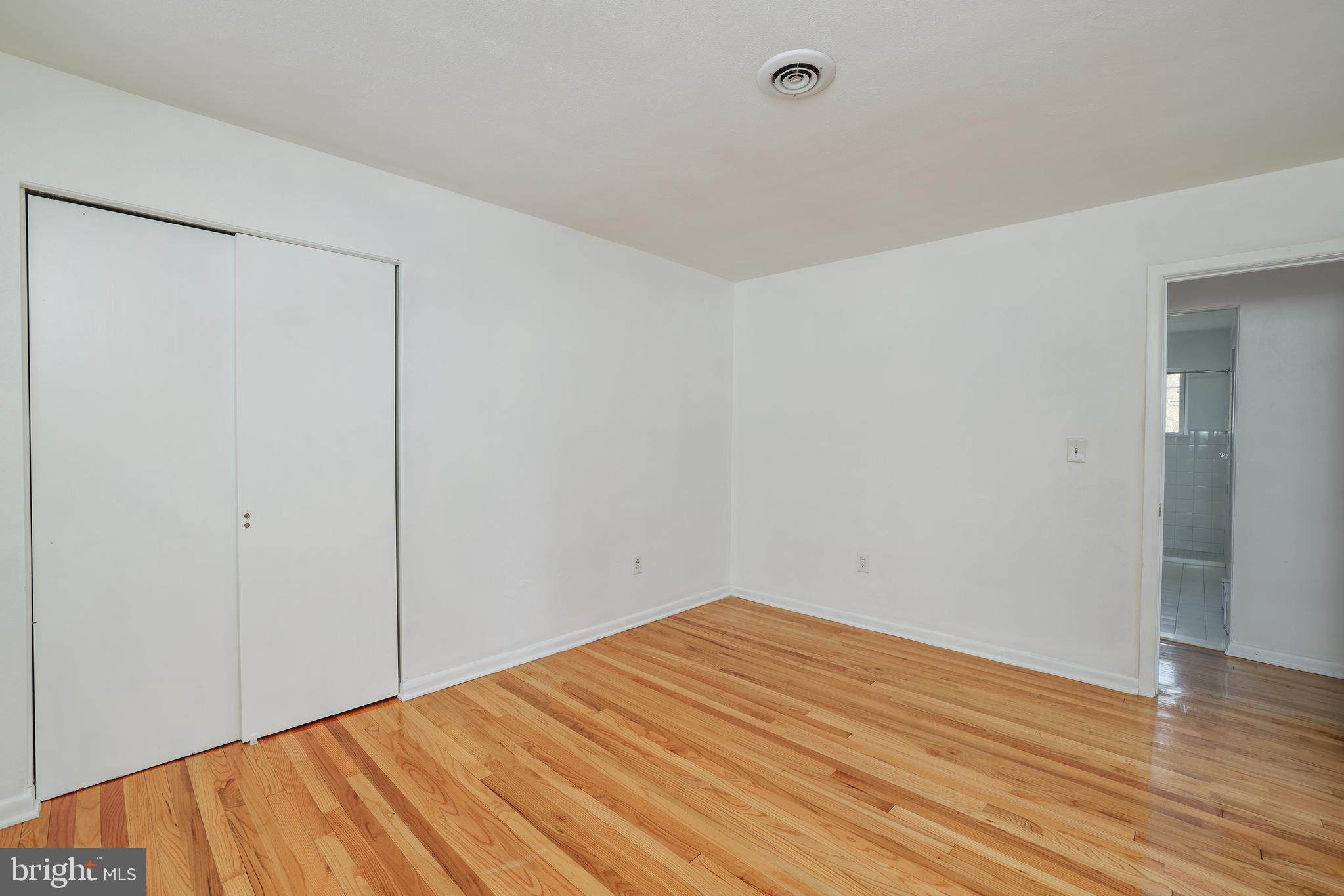 2627 Pennington Road Pennington, NJ 08534 - Photo 17 of 31 a view of empty room with wooden floor