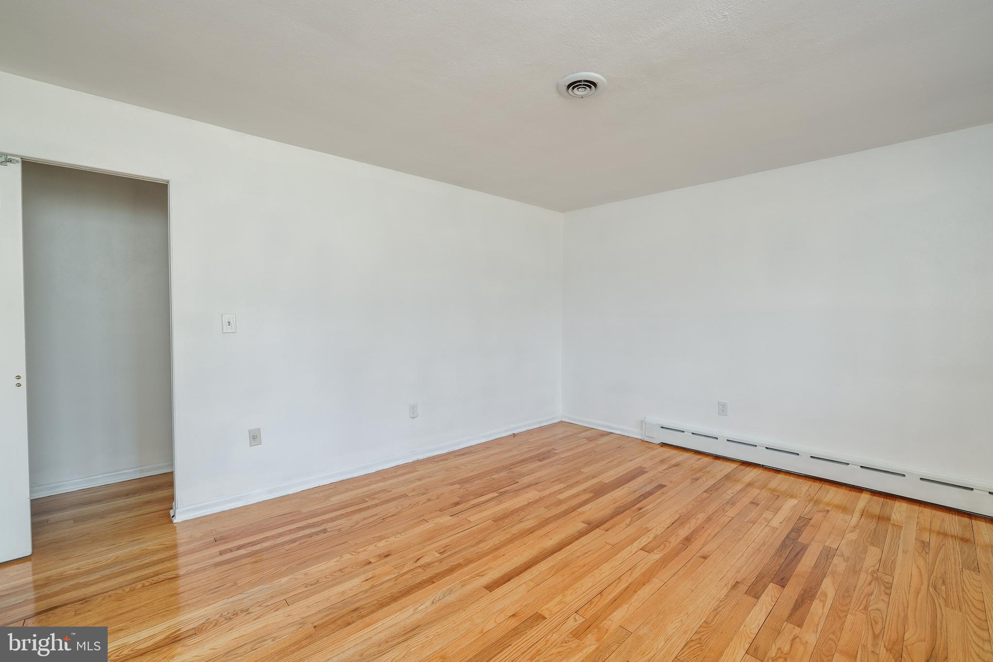 2627 Pennington Road Pennington, NJ 08534 - Photo 21 of 31 a view of empty room with wooden floor