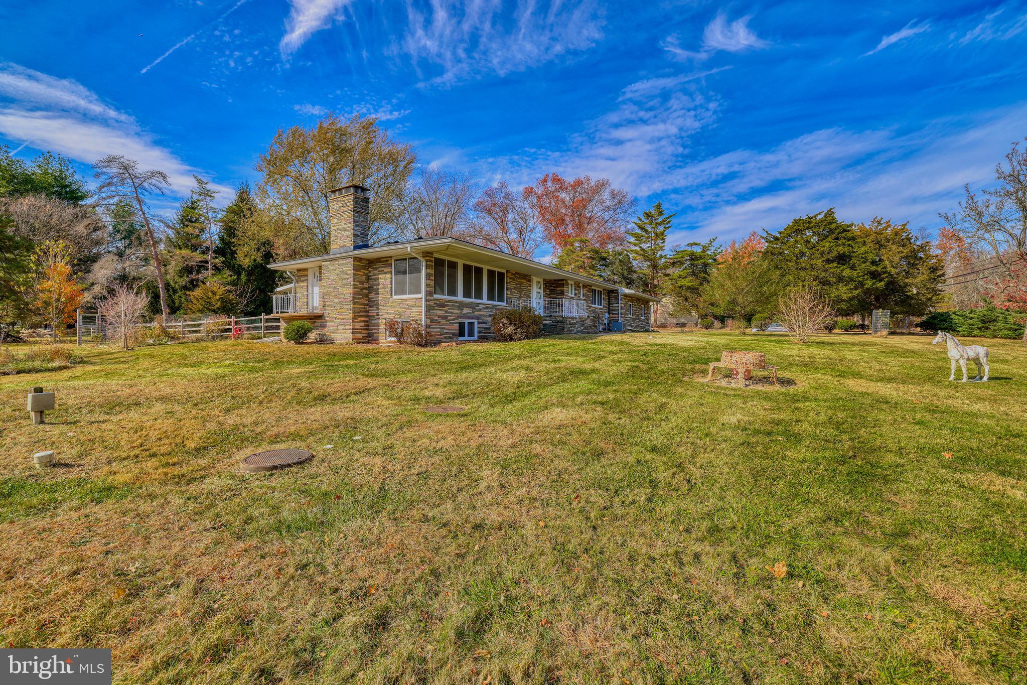 2627 Pennington Road Pennington, NJ 08534 - Photo 4 of 31 a big yard with large trees
