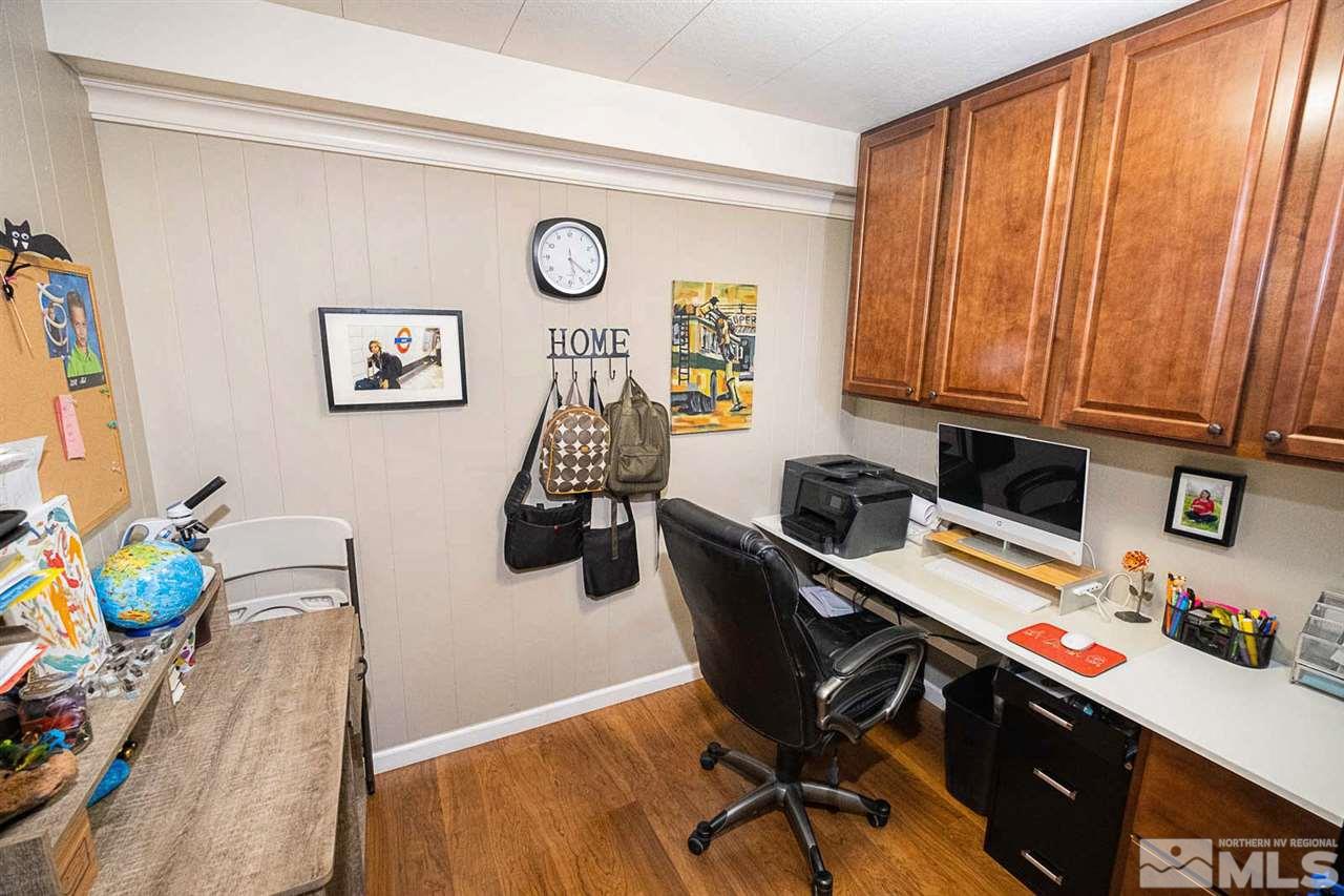 200 Gemini Circle Reno, NV 89521 - Photo 16 of 31 a view of a workspace with furniture and a window