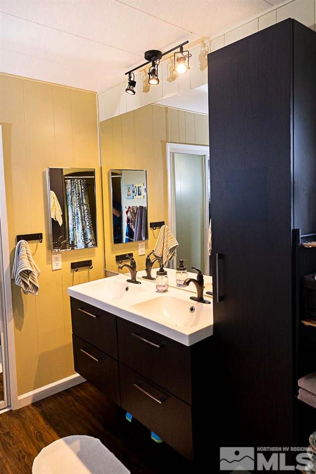 200 Gemini Circle Reno, NV 89521 - Photo 19 of 31 a bathroom with a sink vanity and mirror
