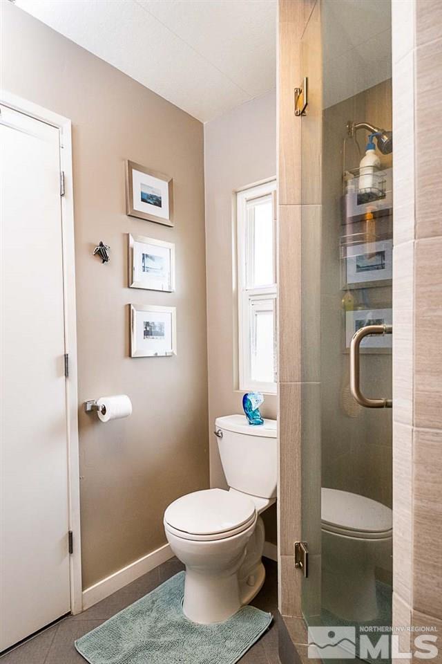 200 Gemini Circle Reno, NV 89521 - Photo 20 of 31 a bathroom with a toilet and a shower