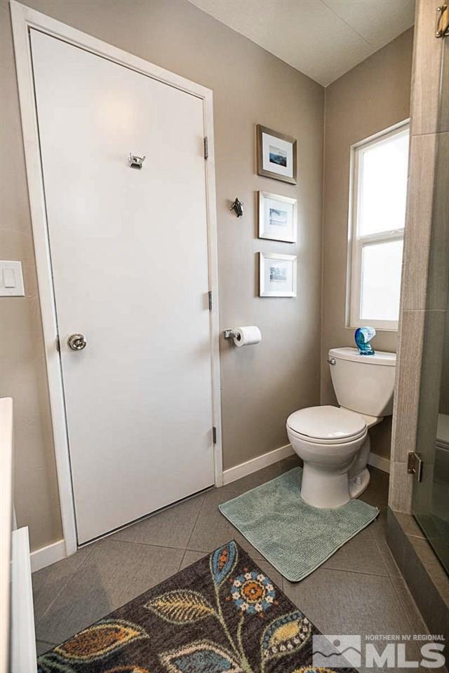 200 Gemini Circle Reno, NV 89521 - Photo 21 of 31 a bathroom with a toilet and a shower