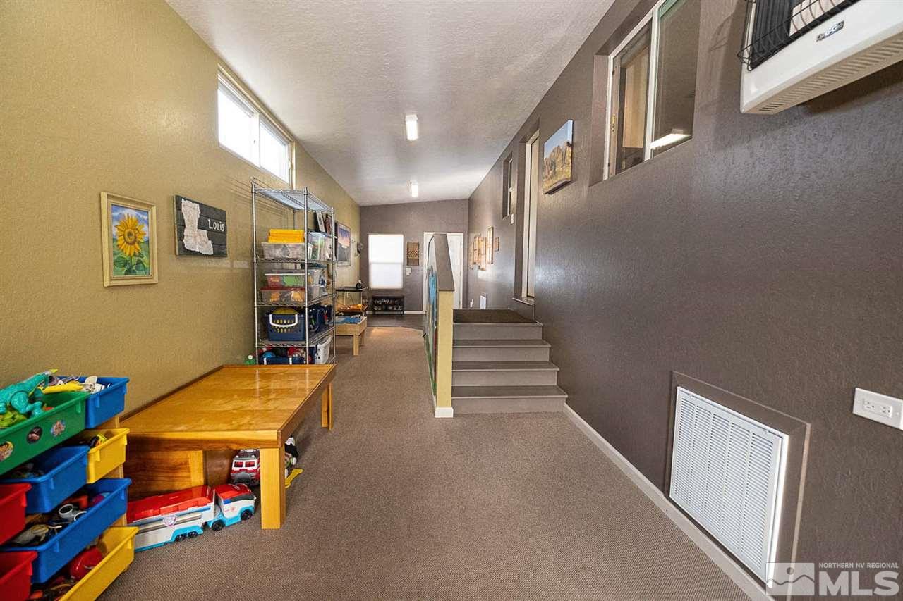 200 Gemini Circle Reno, NV 89521 - Photo 25 of 31 a room with gym equipment and stairs