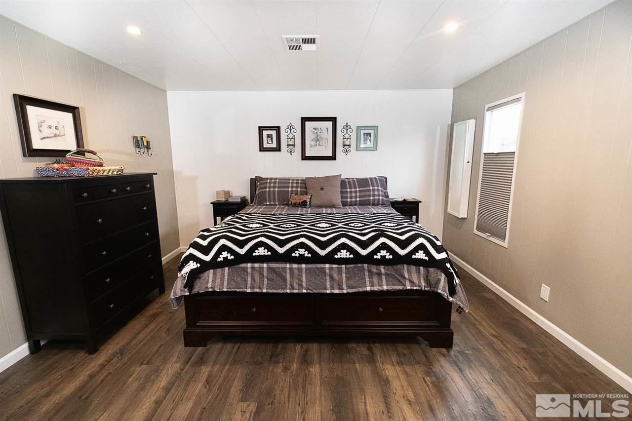 200 Gemini Circle Reno, NV 89521 - Photo 10 of 31 a bedroom with a bed window and a dresser