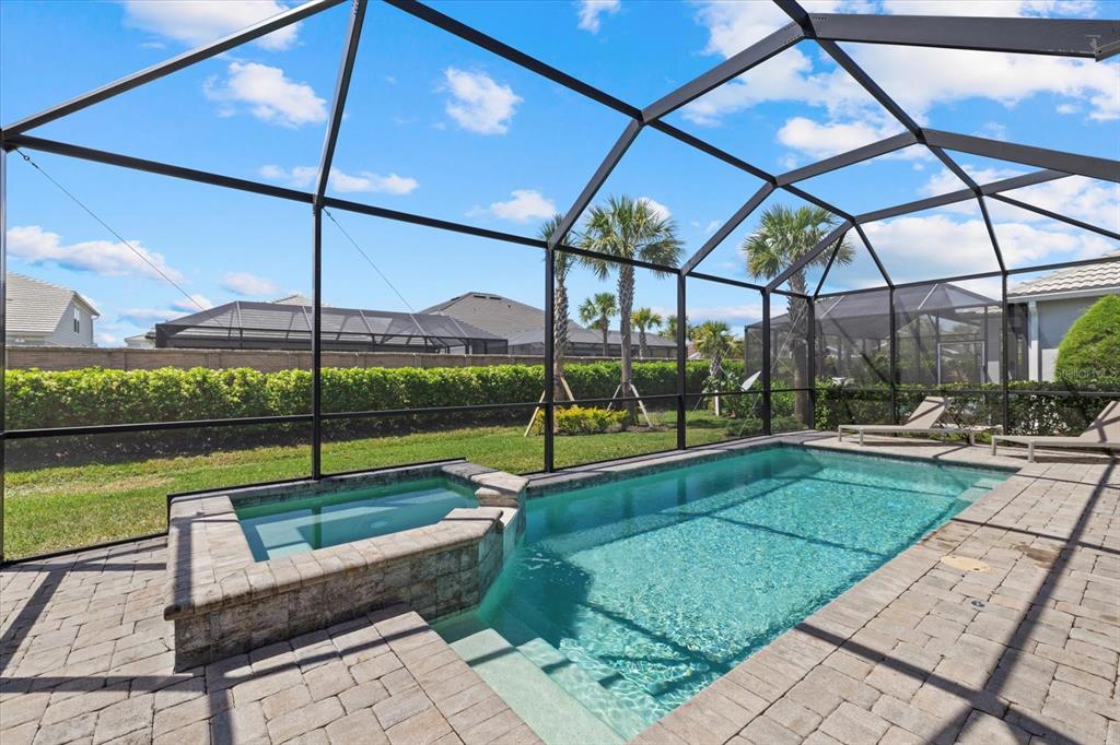 3508 Anchor Bay Trail Lakewood Ranch, FL 34211 - Photo 34 of 74 a view of a backyard with sitting area