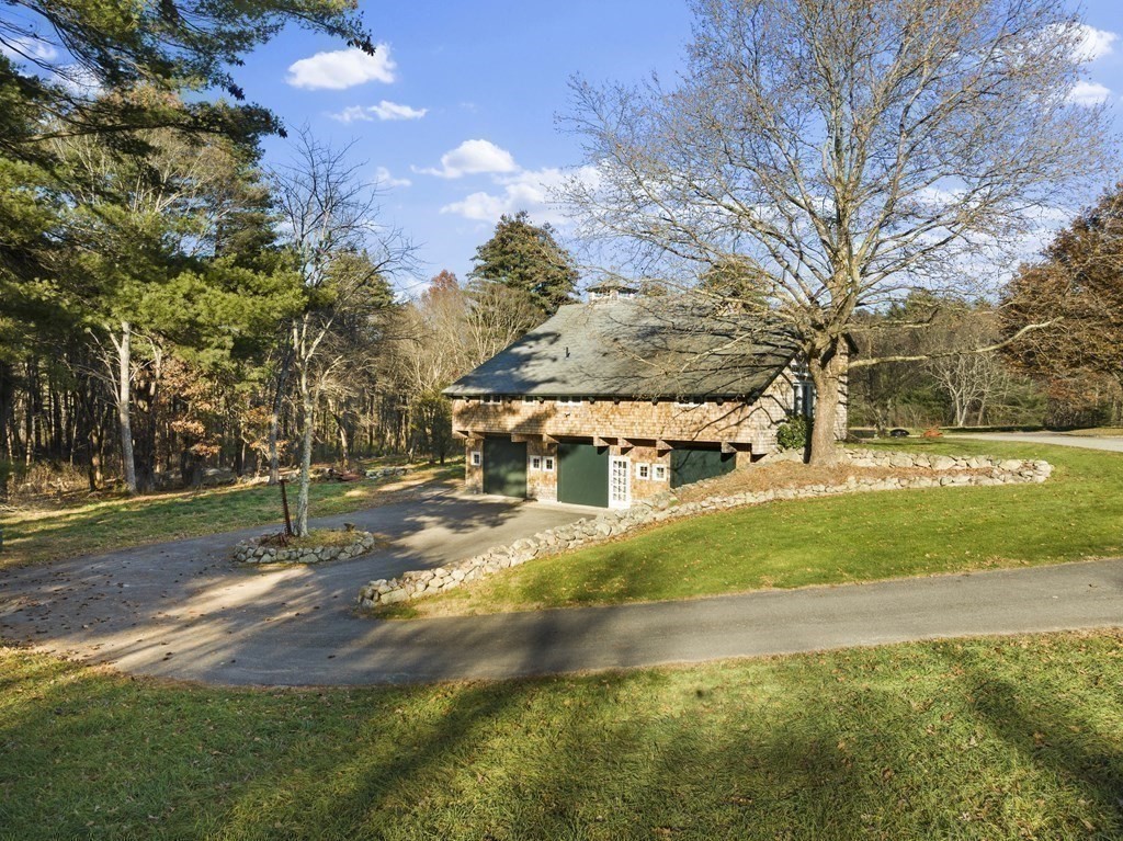 48 Lincoln Road Wayland, MA 01778 - Photo 4 of 11 a view of a house with a big yard