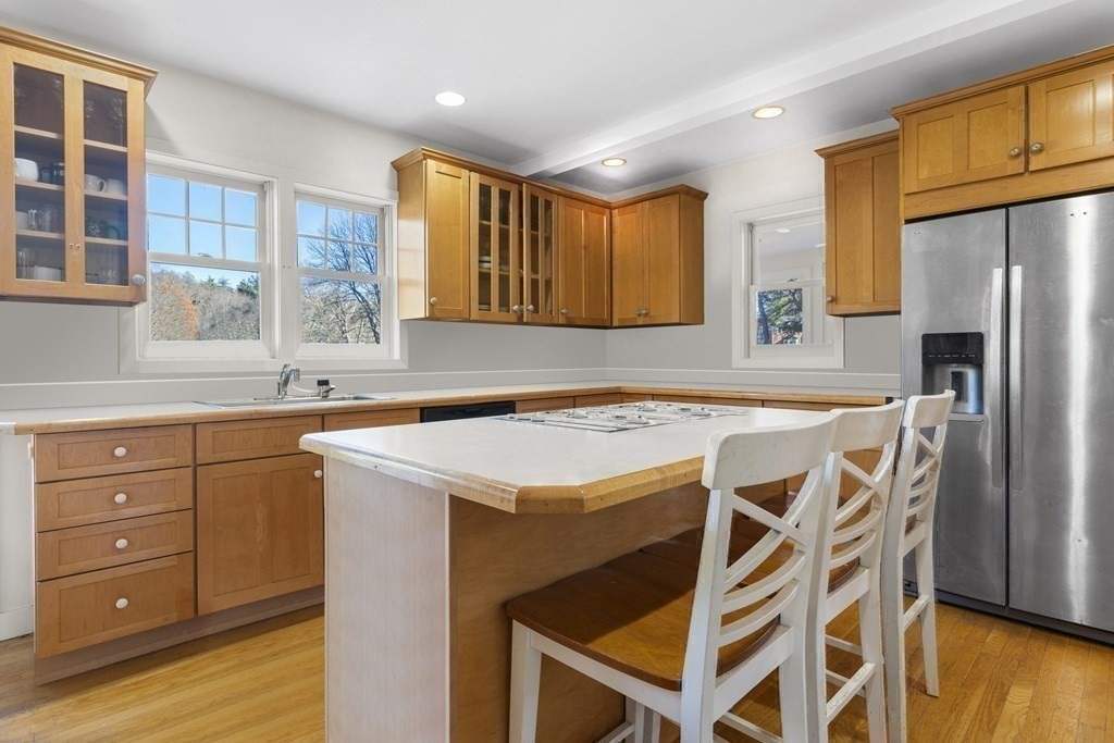 48 Lincoln Road Wayland, MA 01778 - Photo 6 of 11 a kitchen with a stove a sink and a refrigerator