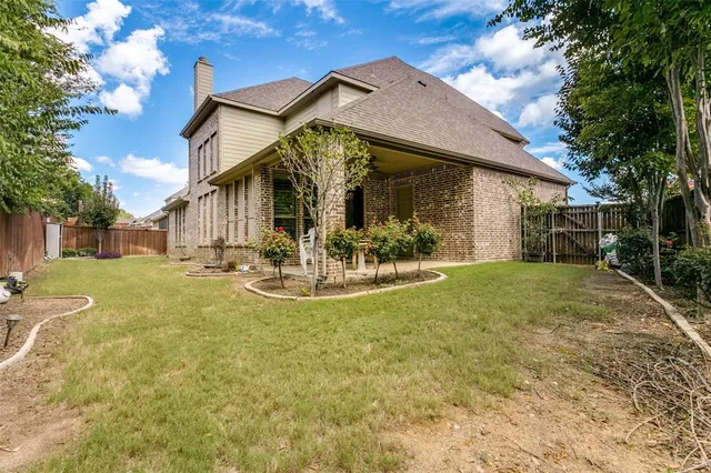 a view of a house with swimming pool